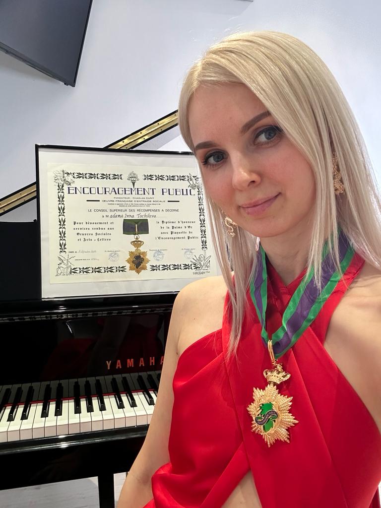 TITLE OF COMMANDER WITH GOLD MEDAL FOR INNA TOCHILOVA